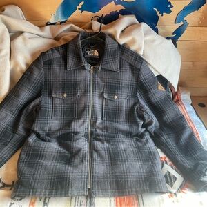 Real wool north face jacket. With down insulation inside